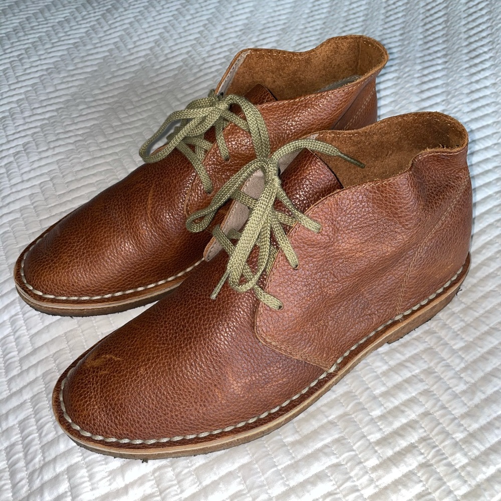 A pair of SeaVees Chukka tan leather boots.